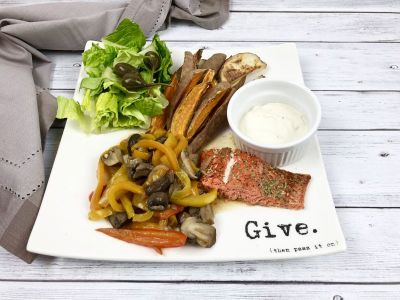 Salmon with sauteed pepper and mushrooms and baked potato wedges